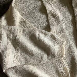 Vintage  wool handmade cardigan. Deep V neckline. 5 button closure. Light Cream